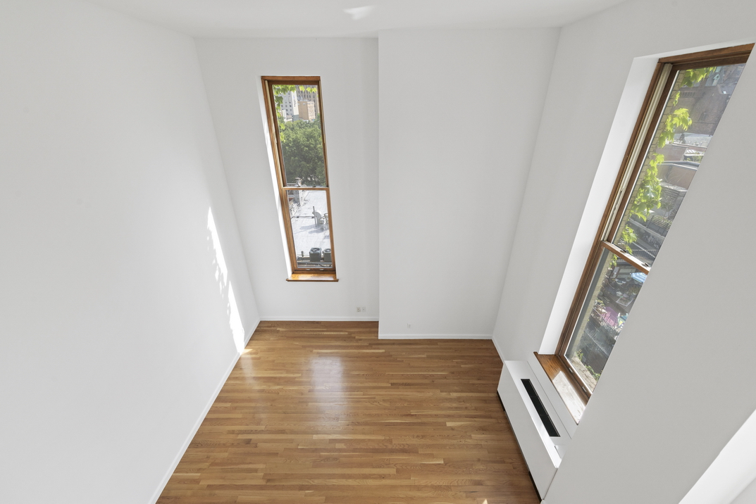 305 2nd Avenue, Unit 505 Manhattan, NY 10003 - Photo 8 of 17 a view of an entryway with wooden floor