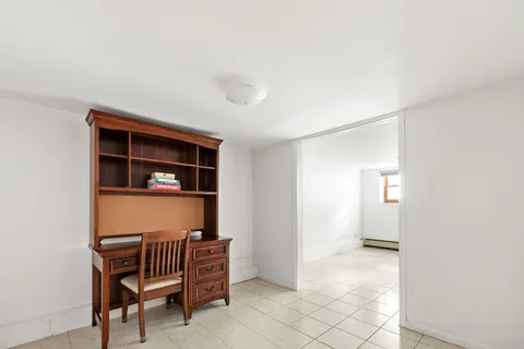 a room with furniture and a window