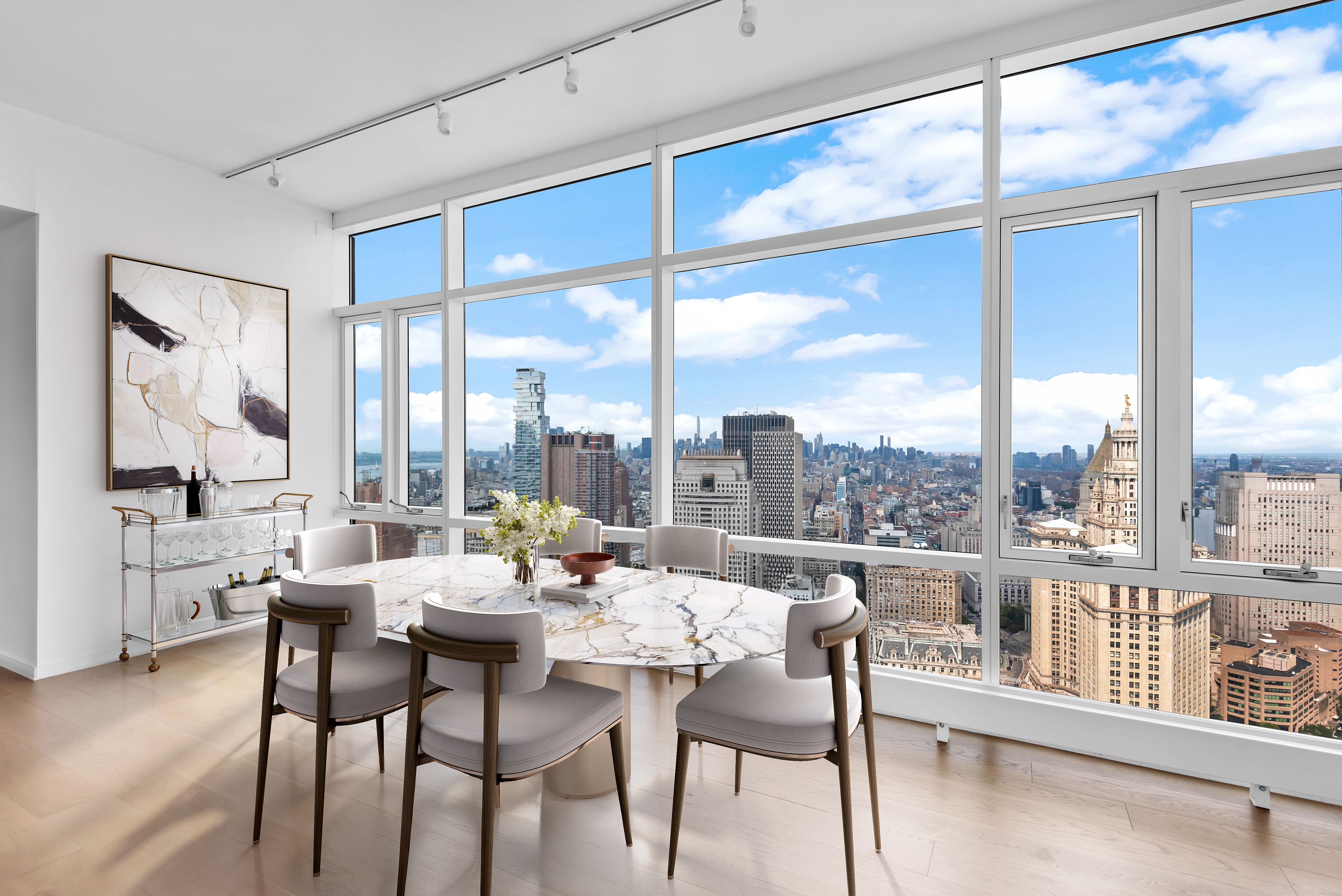 5 Beekman Street, Unit 48B Manhattan, NY 10038 - Photo 3 of 17 a dining room with furniture water view and large windows