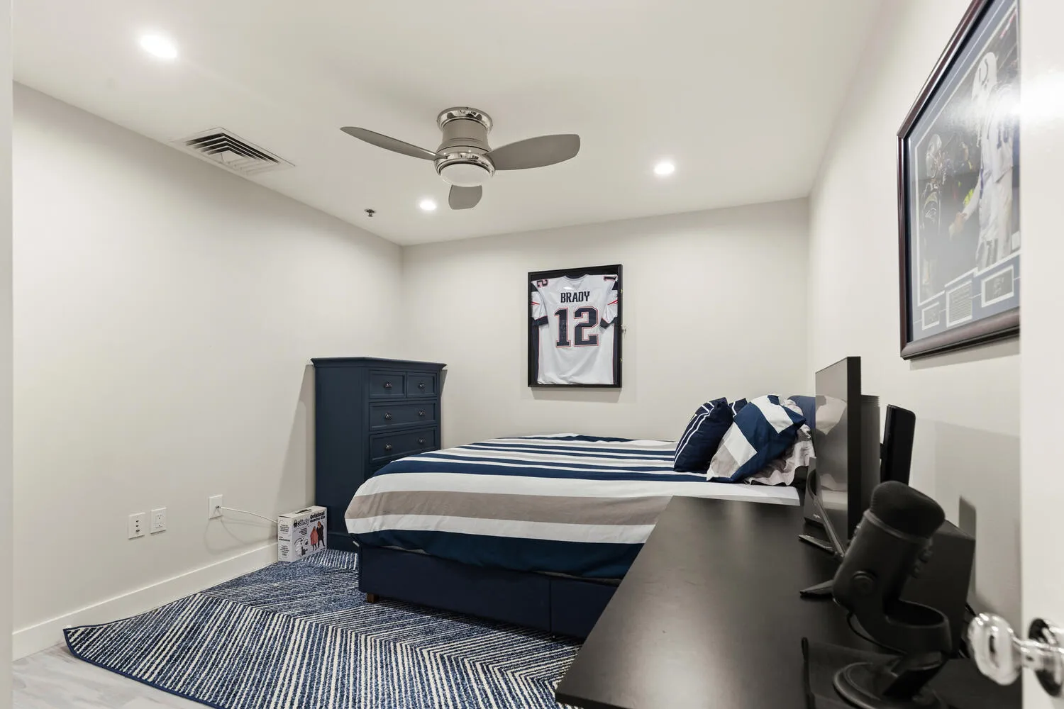 a bathroom with a shower a toilet and a sink