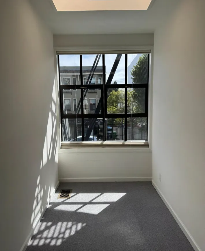an empty room with a window