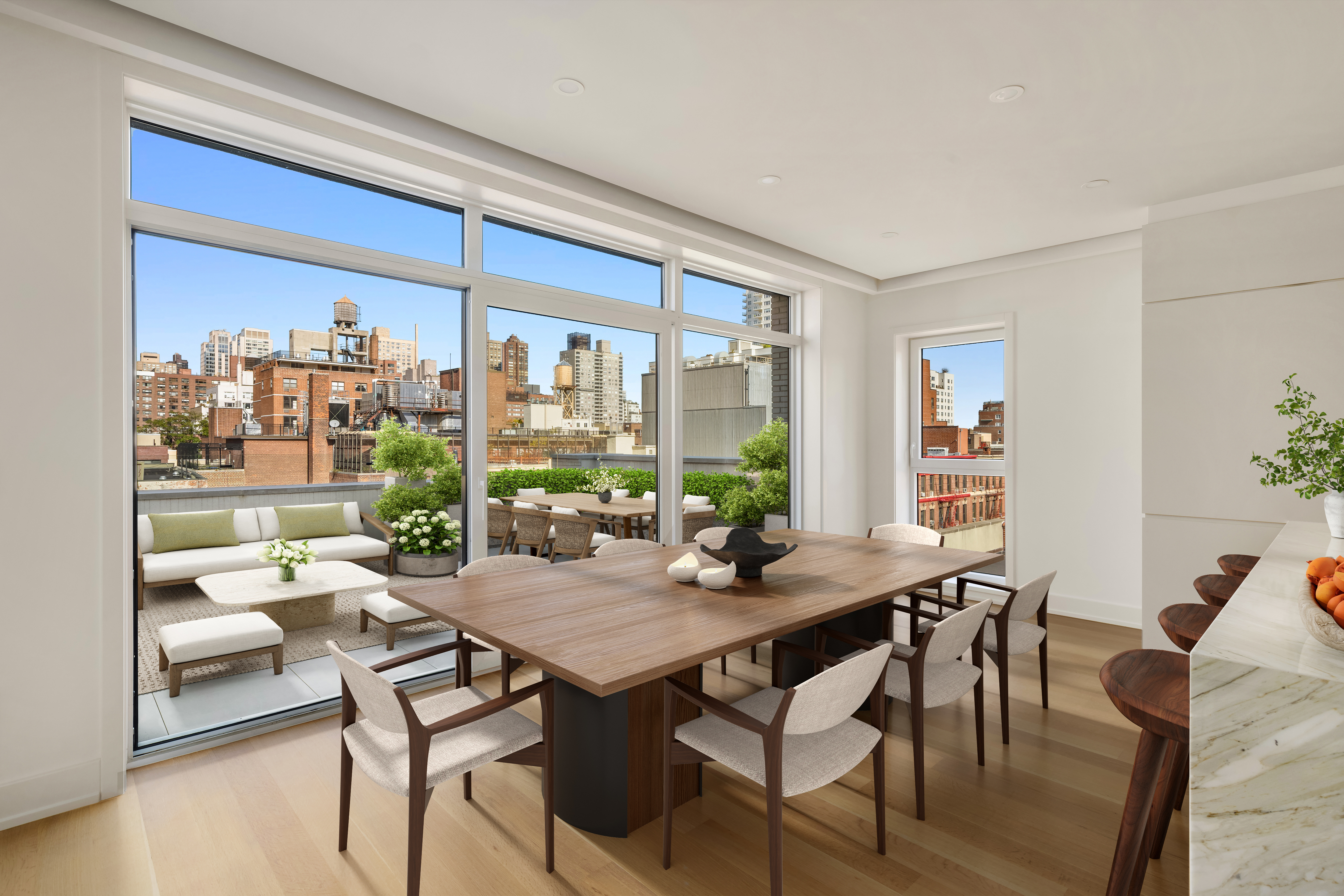 420 East 75th Street, Unit PH Manhattan, NY 10021 - Photo 3 of 24 a view of a dining room with furniture window and wooden floor