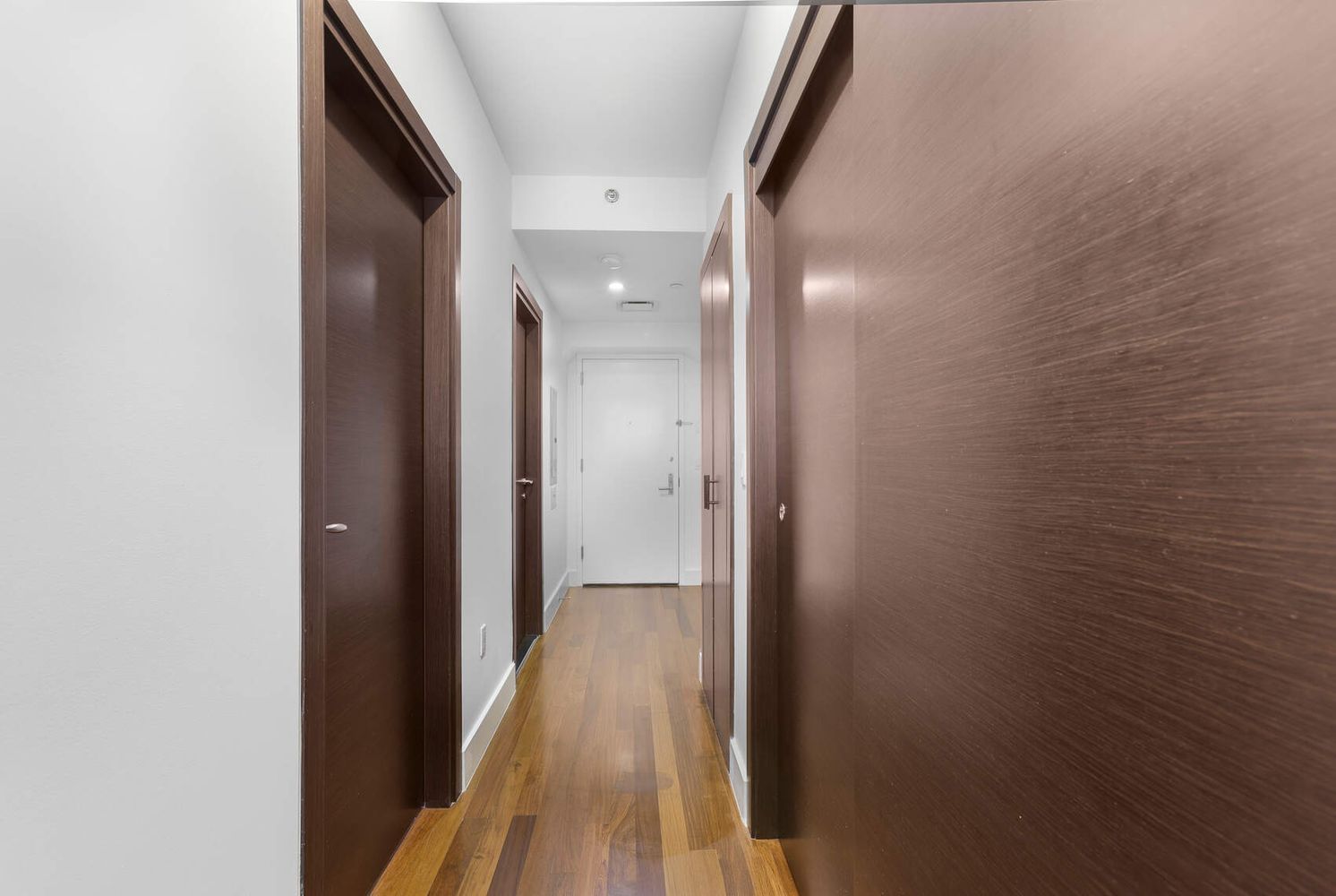 150 Myrtle Avenue, Unit PH3201 Brooklyn, NY 11201 - Photo 23 of 40 a view of a hallway with wooden floor