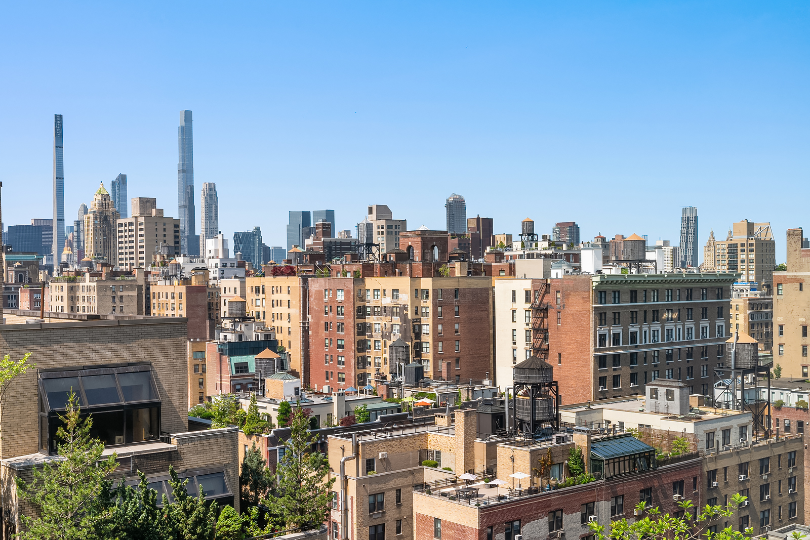 151 East 85th Street, Unit 17B Manhattan, NY 10028 - Photo 7 of 10 a view of a city with tall buildings