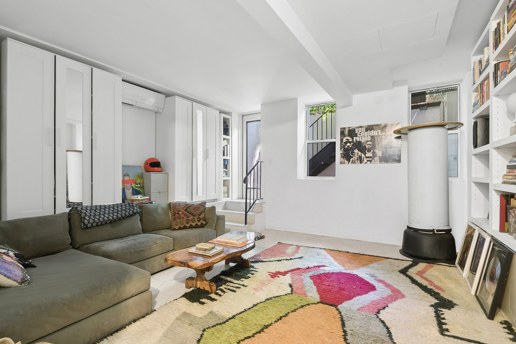 576 A MacDonough Street, Unit 1 Brooklyn, NY 11233 - Photo 3 of 6 a living room with furniture and a couch