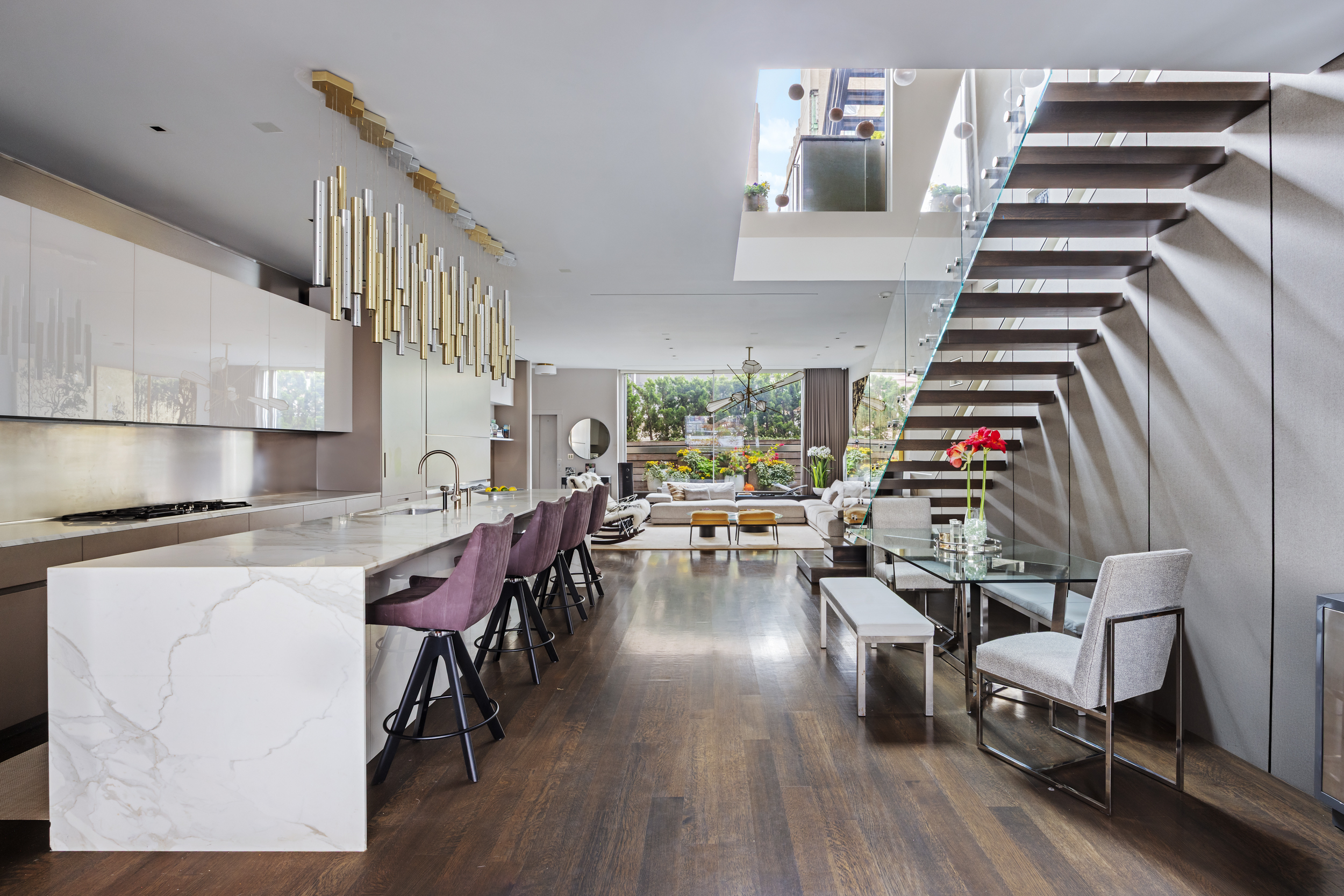42 White Street, Unit PH Manhattan, NY 10013 - Photo 10 of 22 a view of kitchen and dining room with wooden floor