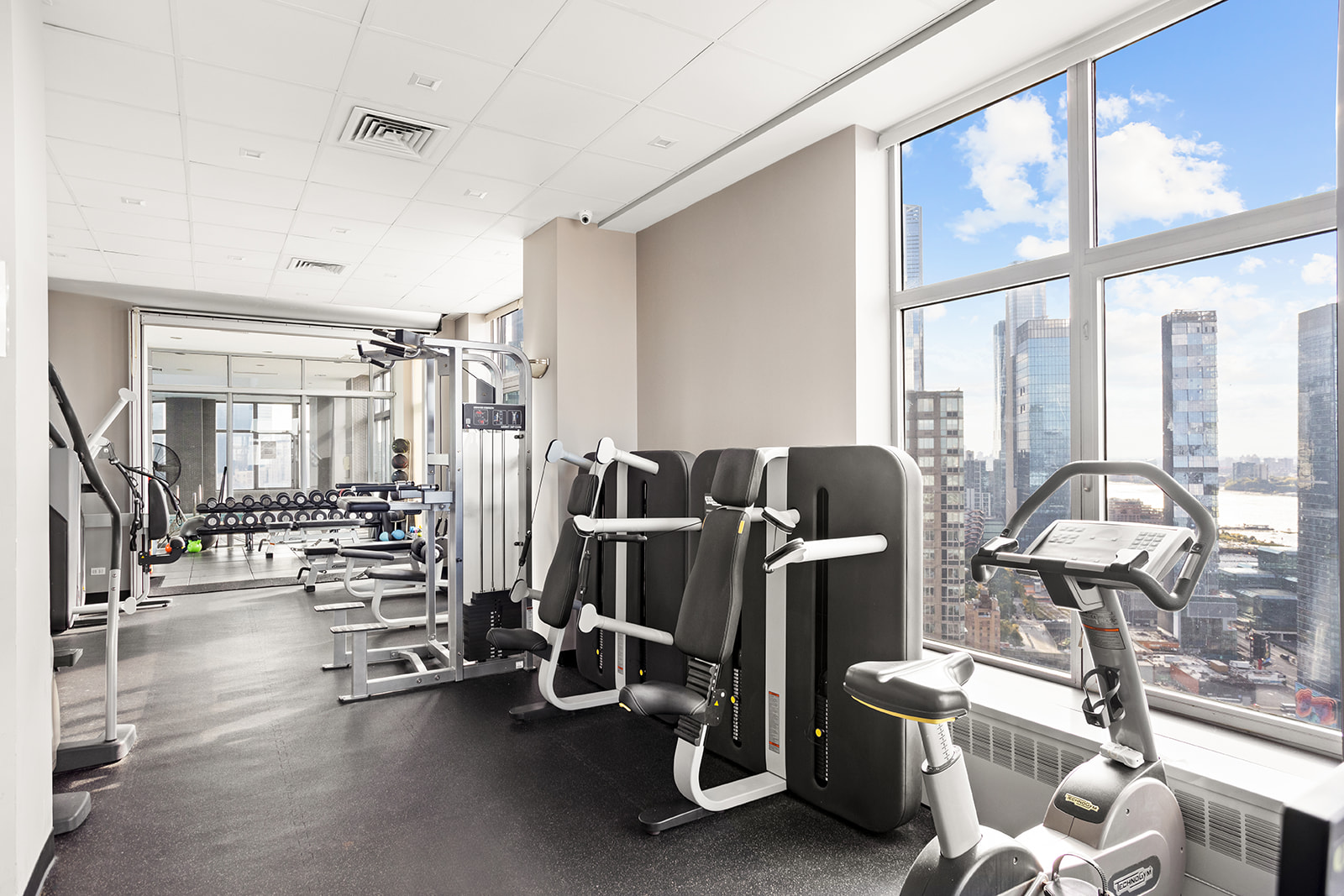 500 West 43rd Street, Unit 3B Manhattan, NY 10036 - Photo 15 of 19 a view of a room with gym equipment