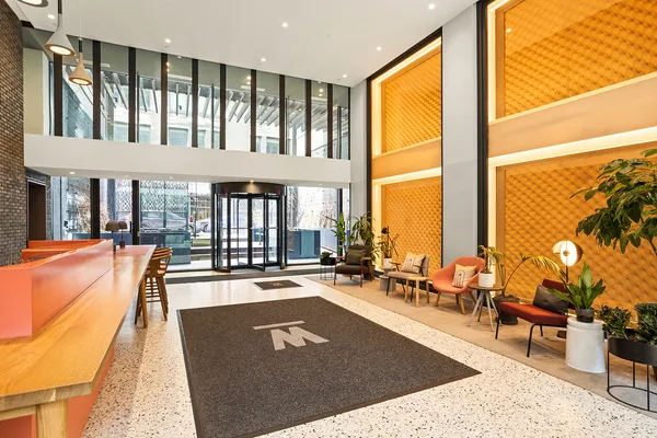 a view of a living room and dining room