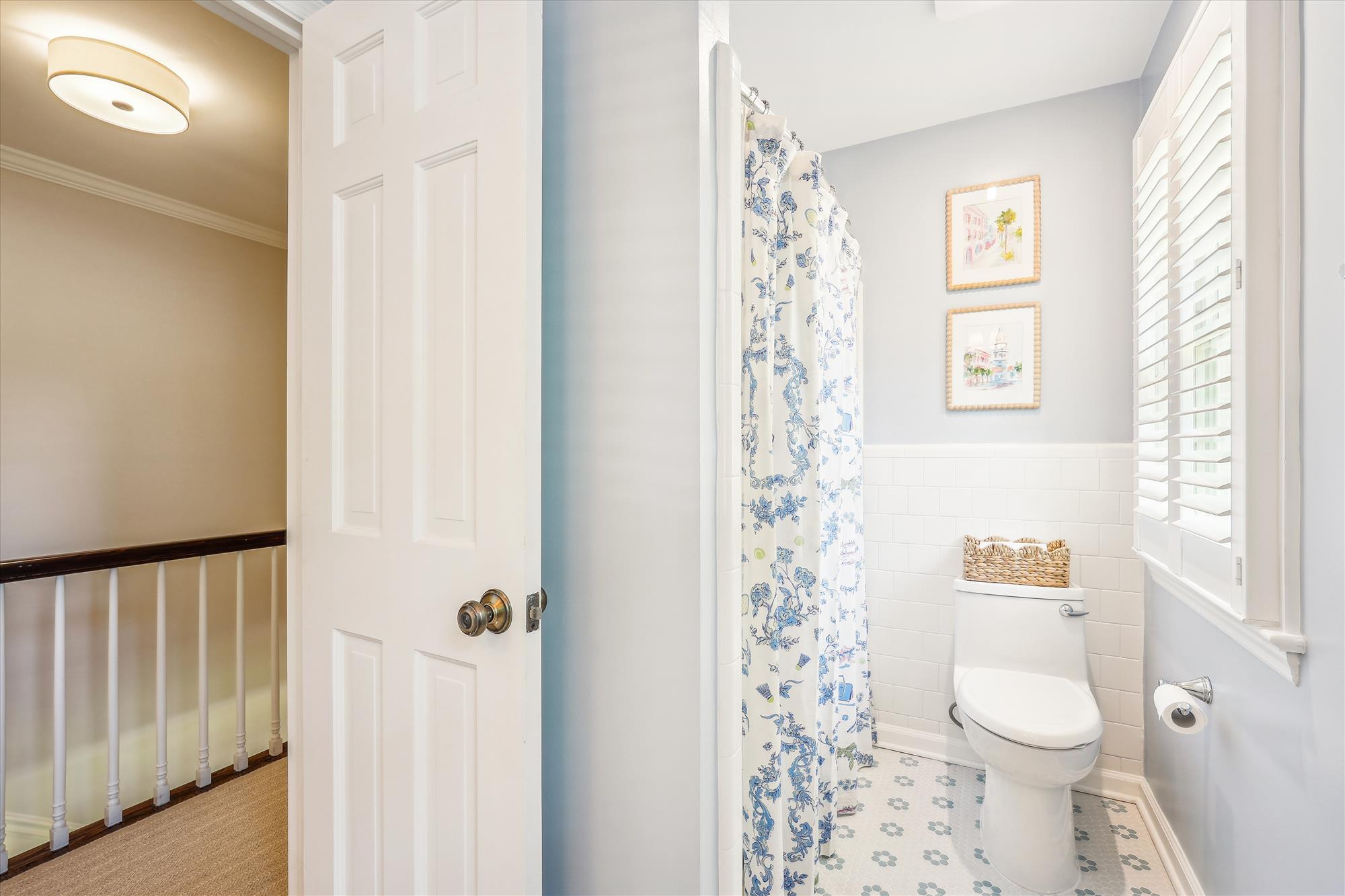 9904 Carter Road Bethesda, MD 20817 - Photo 27 of 41 a bathroom with a toilet and a shower curtain