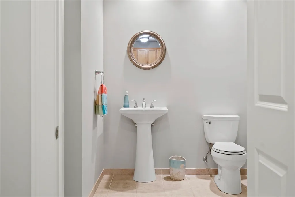 a bathroom with a toilet and a sink