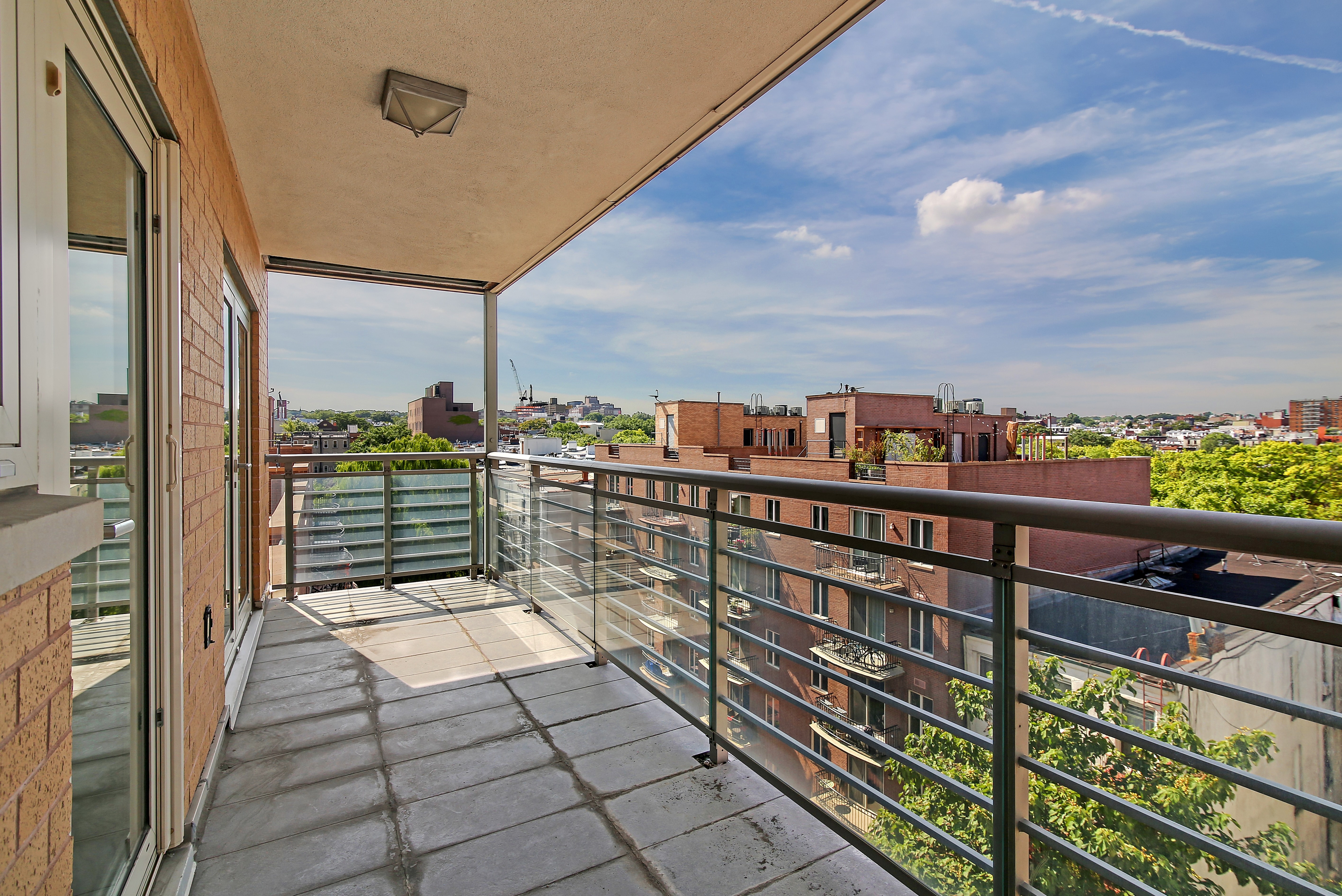 302 2nd Street, Unit 9L Brooklyn, NY 11215 - Photo 8 of 9 a view of city from a balcony