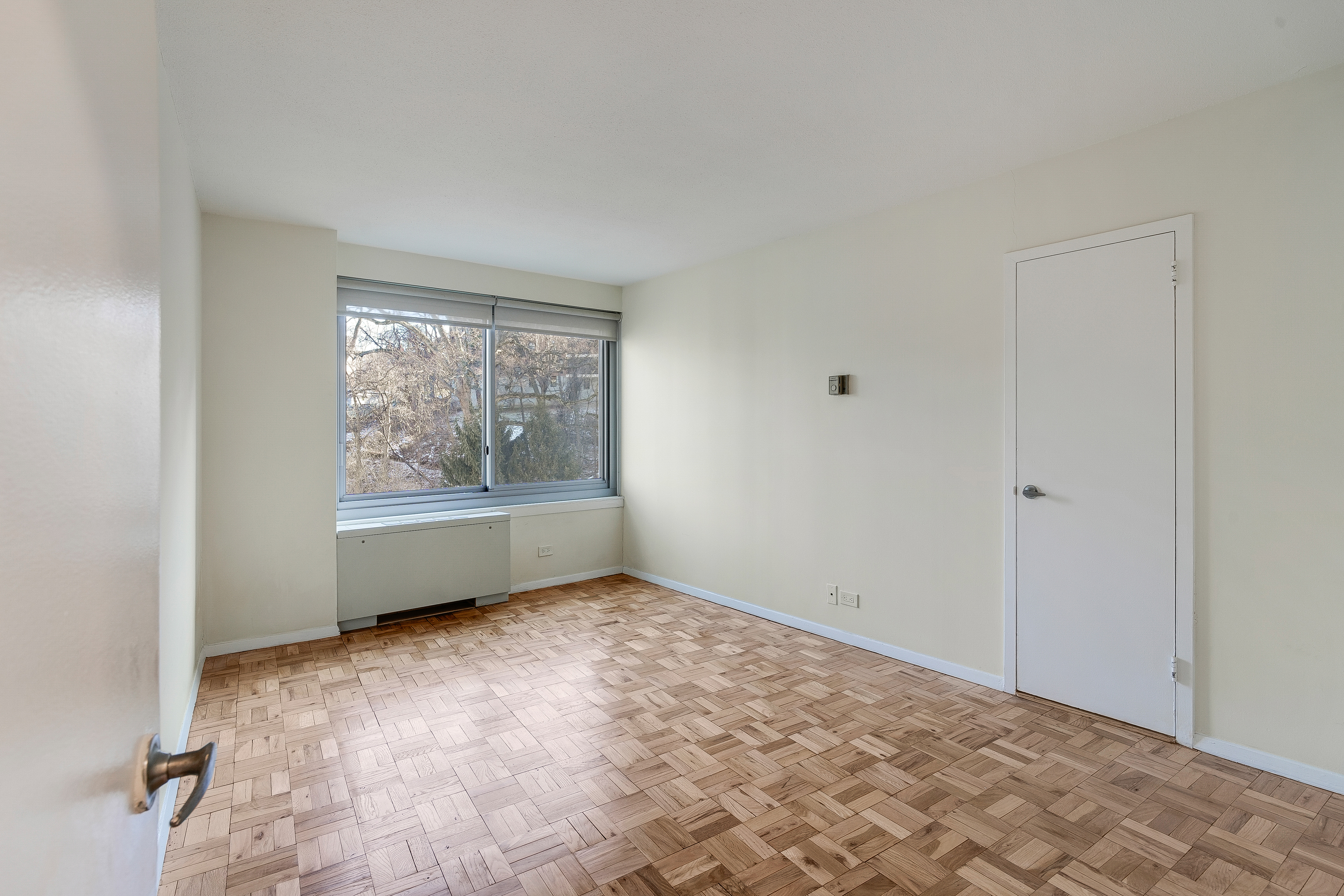 4455 Douglas Avenue, Unit 8A Bronx, NY 10471 - Photo 3 of 22 a view of an empty room with a window