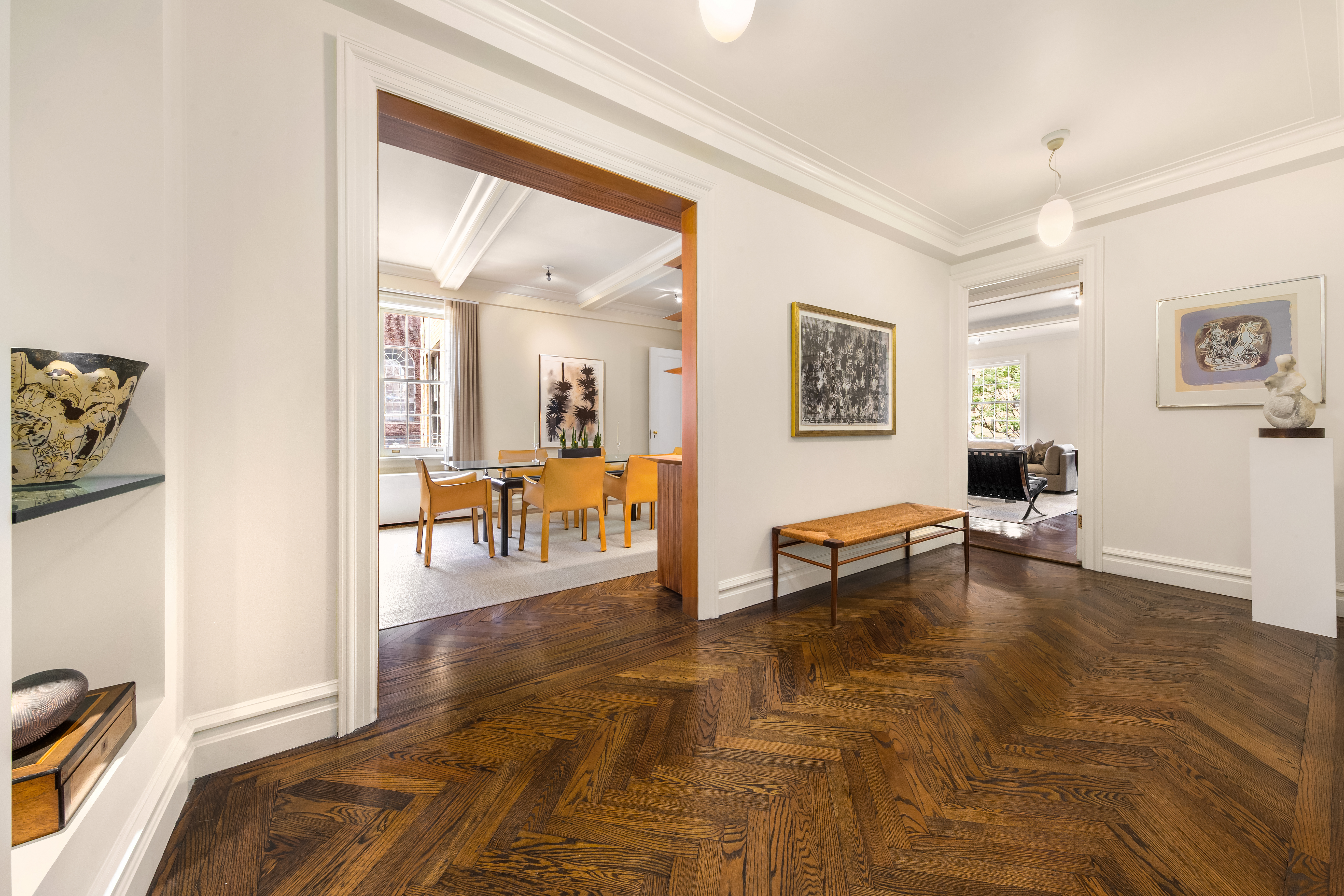 162 East 80th Street Manhattan, NY 10075 - Photo 6 of 13 a living room with furniture and a table