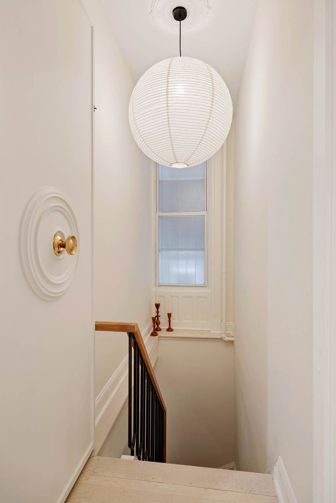 a view of entryway with kitchen