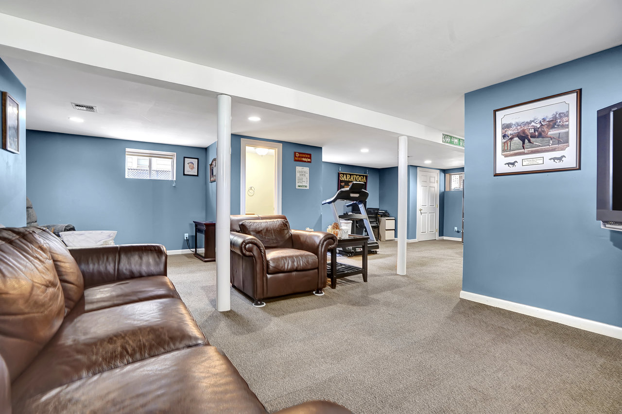 266 Feronia Way Rutherford, NJ 07070 - Photo 33 of 41 a living room with furniture and a couch