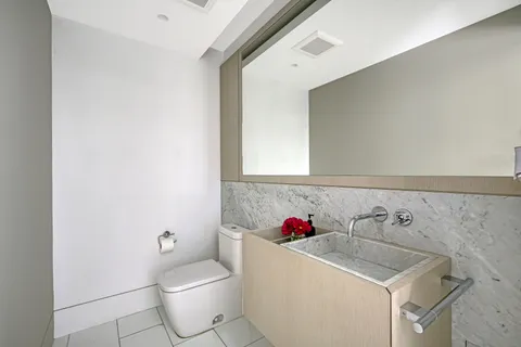a bathroom with a sink and a toilet