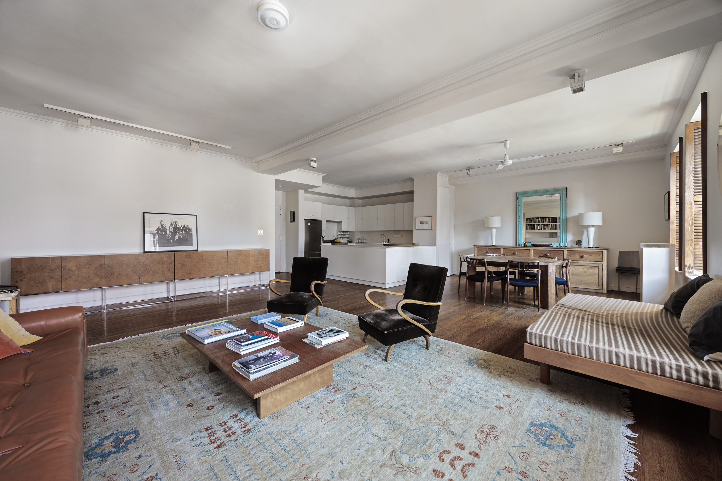 260 West Broadway, Unit 10D Manhattan, NY 10013 - Photo 3 of 20 a living room with furniture and wooden floor
