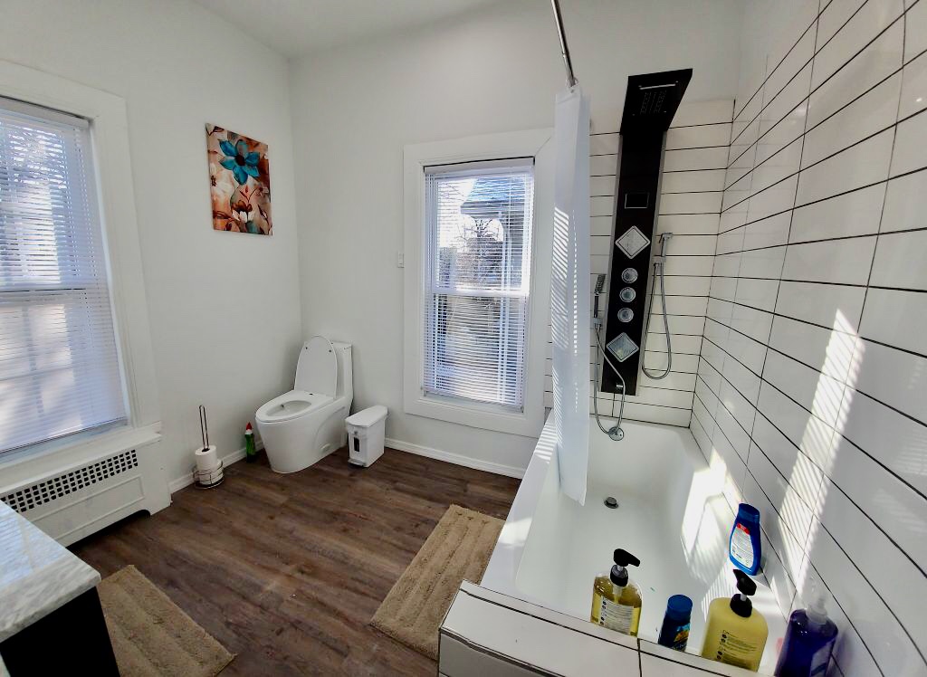 1112 Beverley Road Brooklyn, NY 11218 - Photo 47 of 53 a living room with furniture and a window