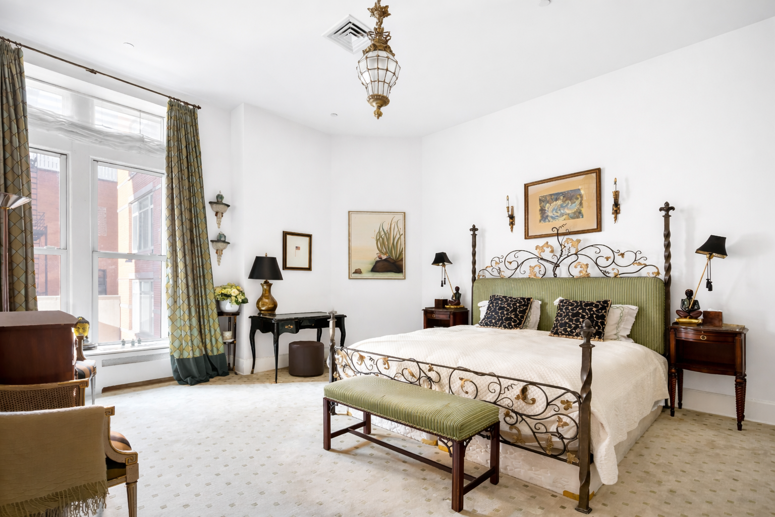 455 Central Park West, Unit 11 Manhattan, NY 10025 - Photo 8 of 18 a bedroom with furniture and a fireplace