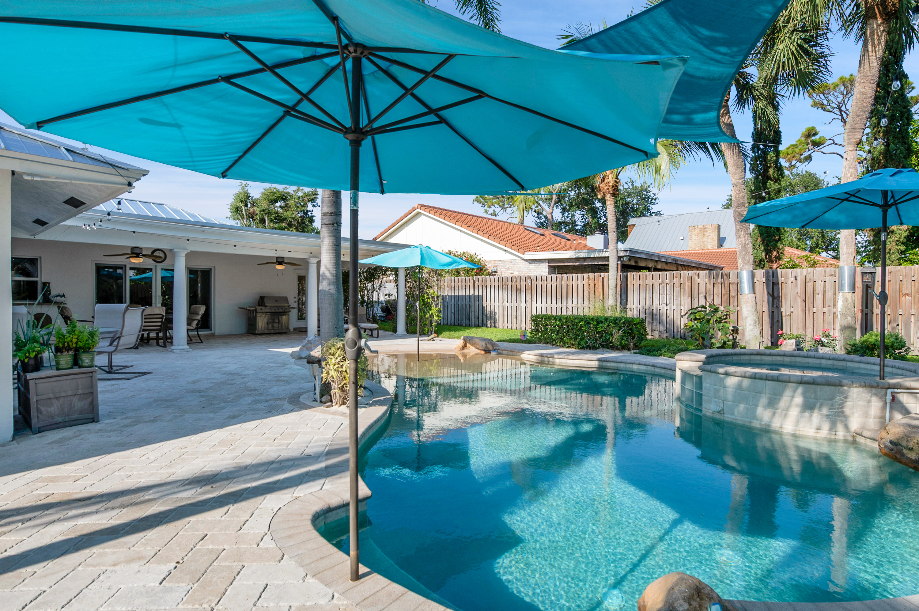 1560 Southwest 16th Street Boca Raton, FL 33486 - Photo 17 of 72 a view of a swimming pool with sitting area