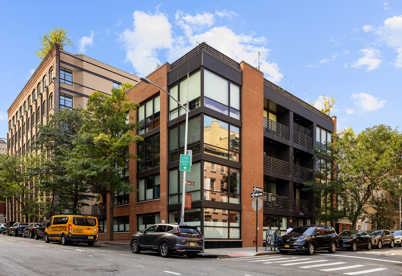 20 Henry Street, Unit 1BN Brooklyn, NY 11201 - Photo 13 of 15 a car parked in front of a building