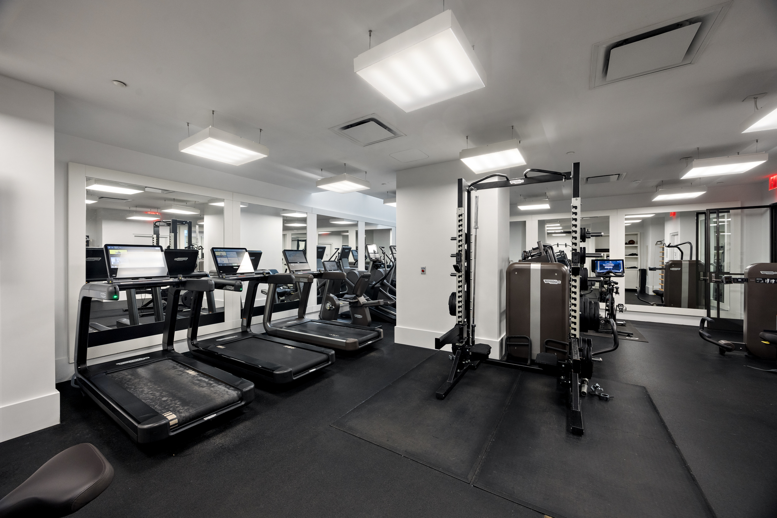 404 Park Avenue South, Unit 3E Manhattan, NY 10016 - Photo 16 of 21 a view of a room with gym equipment