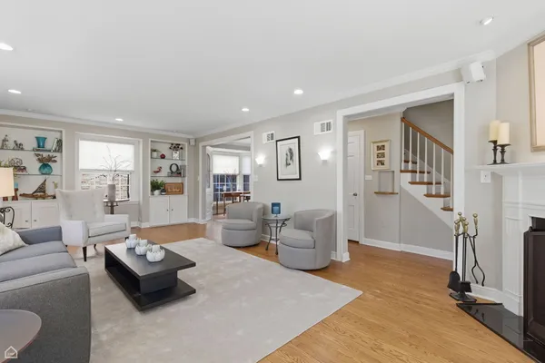 a living room with furniture and a table