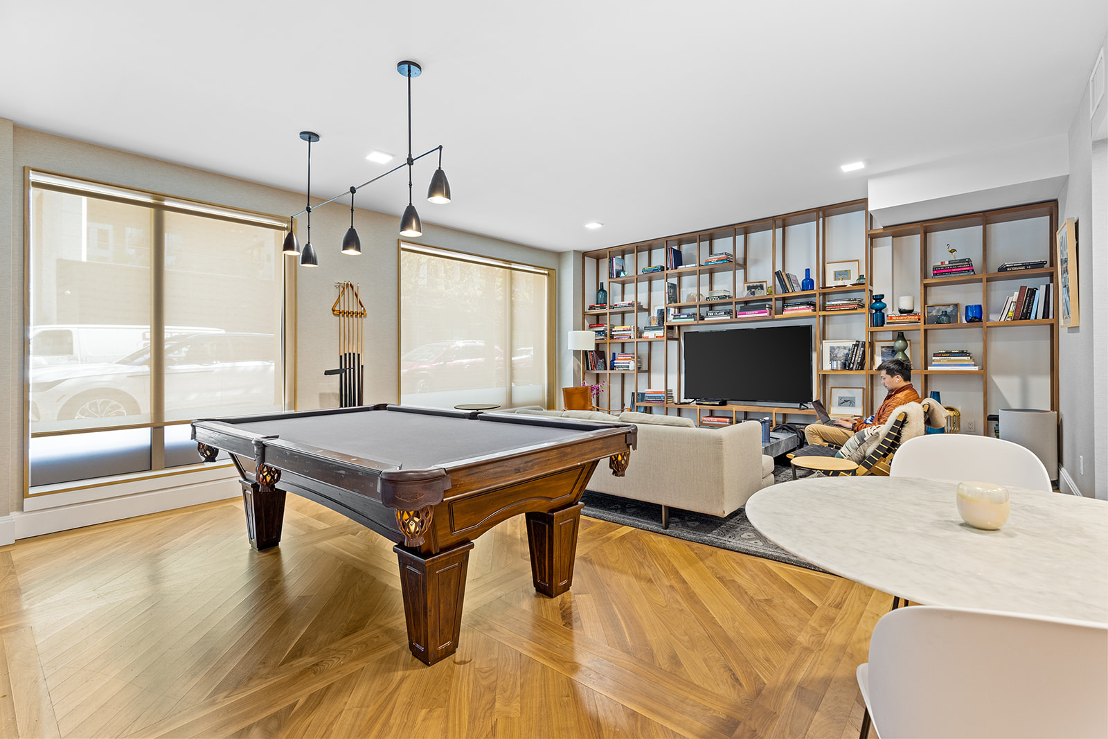610 Warren Street, Unit GDNB Brooklyn, NY 11217 - Photo 13 of 17 a living room with furniture a flat screen tv and a large window