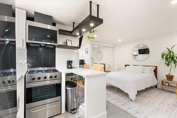 a view of a balcony with chairs