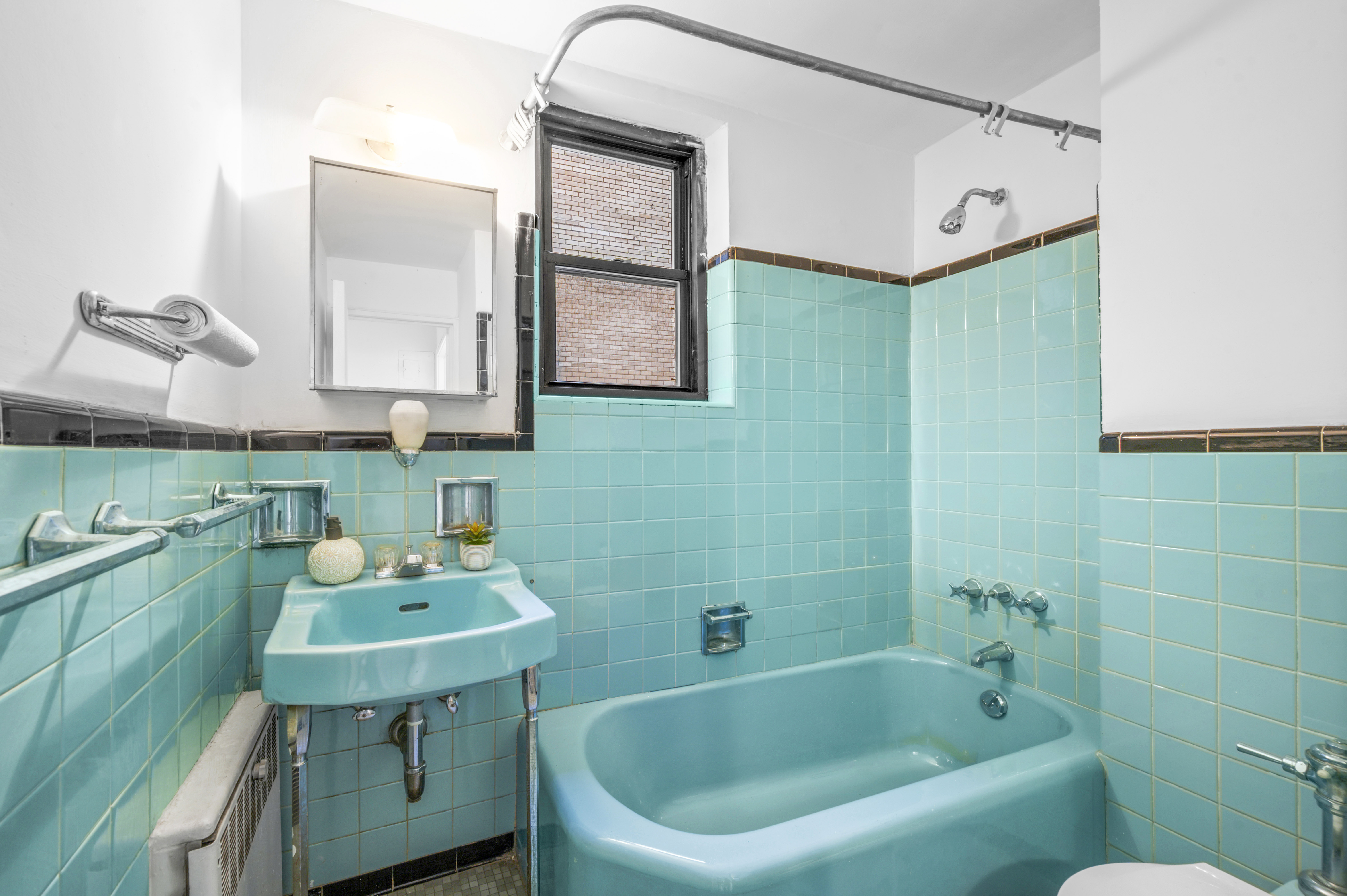 7 Park Avenue, Unit 66 Manhattan, NY 10016 - Photo 8 of 11 a bathroom with a sink mirror toilet and bathtub