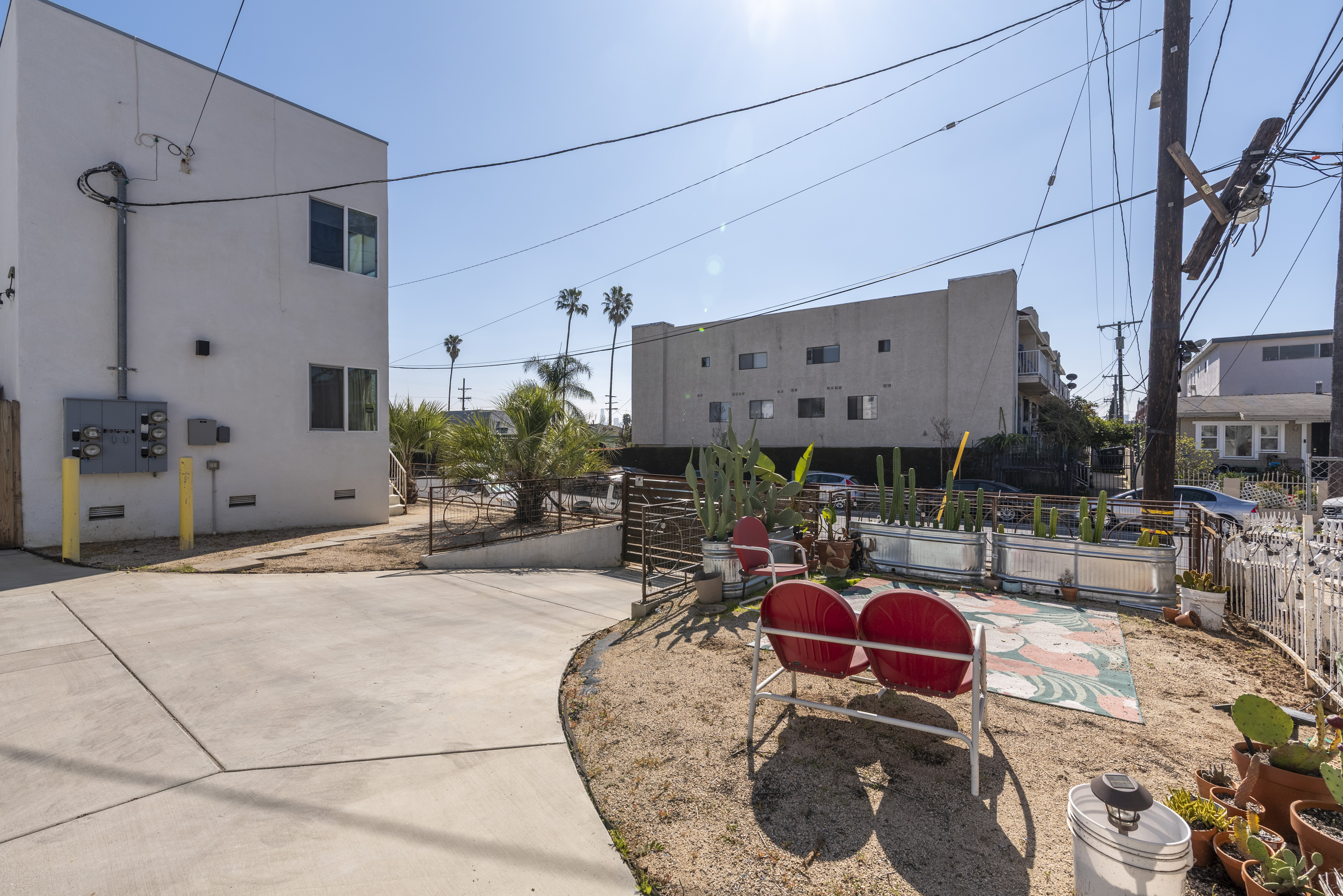 1005 Alexandria Avenue Los Angeles, CA 90029 - Photo 19 of 21 a building outdoor space with patio furniture and potted plants