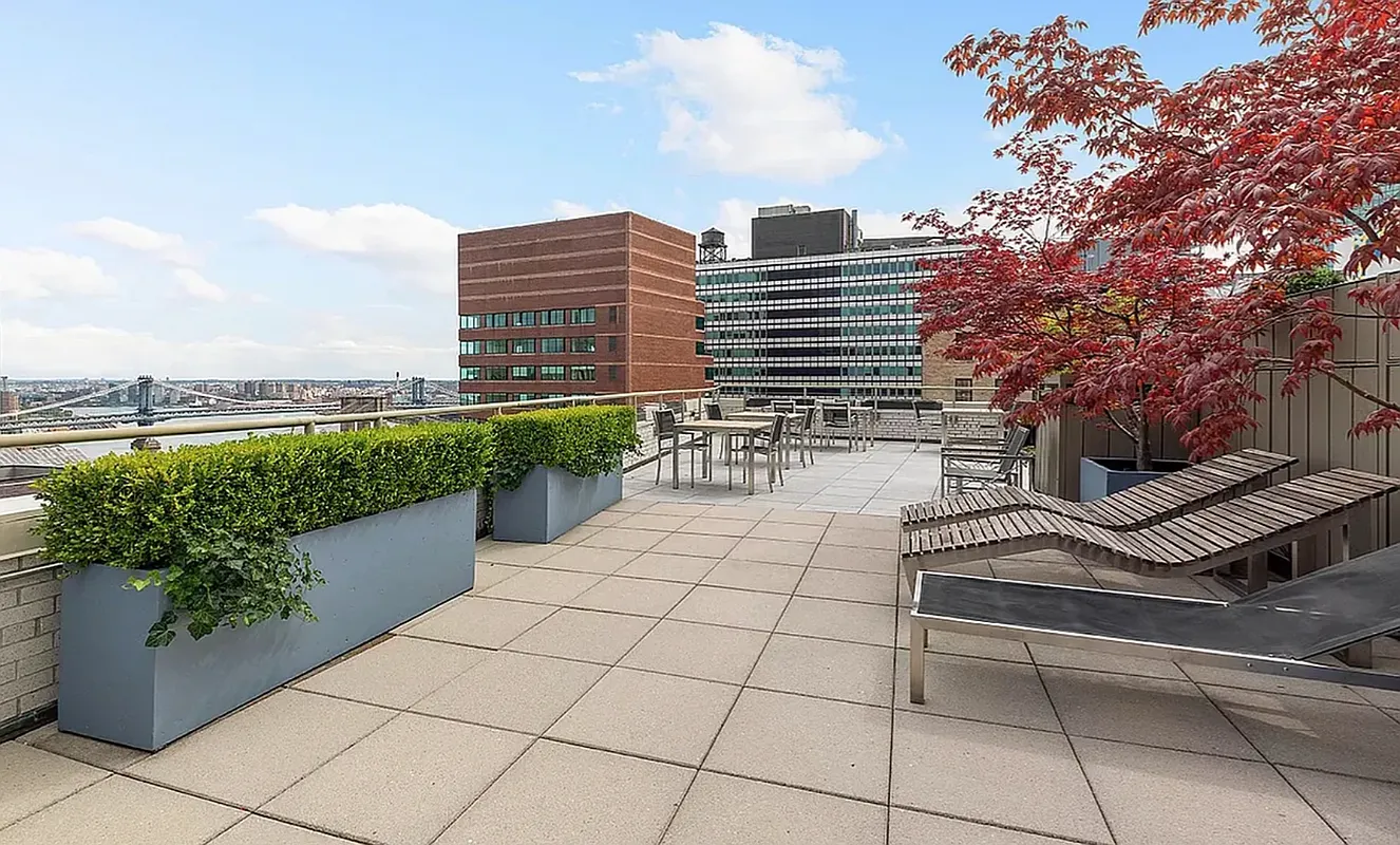 99 John Street, Unit 920 Manhattan, NY 10038 - Photo 15 of 18 a view of a terrace with chairs