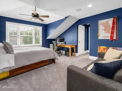 a living room with furniture pool table and a table