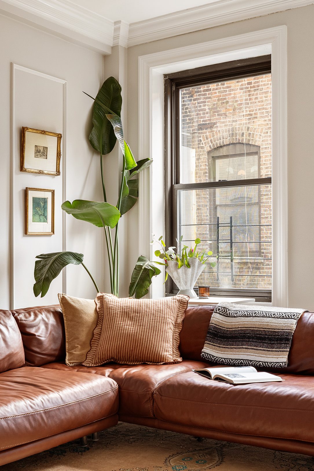 215 West 91st Street, Unit 77 Manhattan, NY 10024 - Photo 3 of 17 a living room with furniture and a window