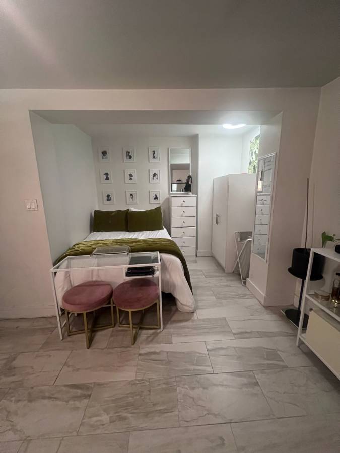 213 Ashland Place, Unit B Brooklyn, NY 11217 - Photo 3 of 4 a room with furniture and a table