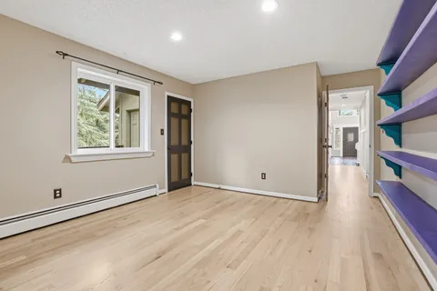 a view of a chairs on the roof deck