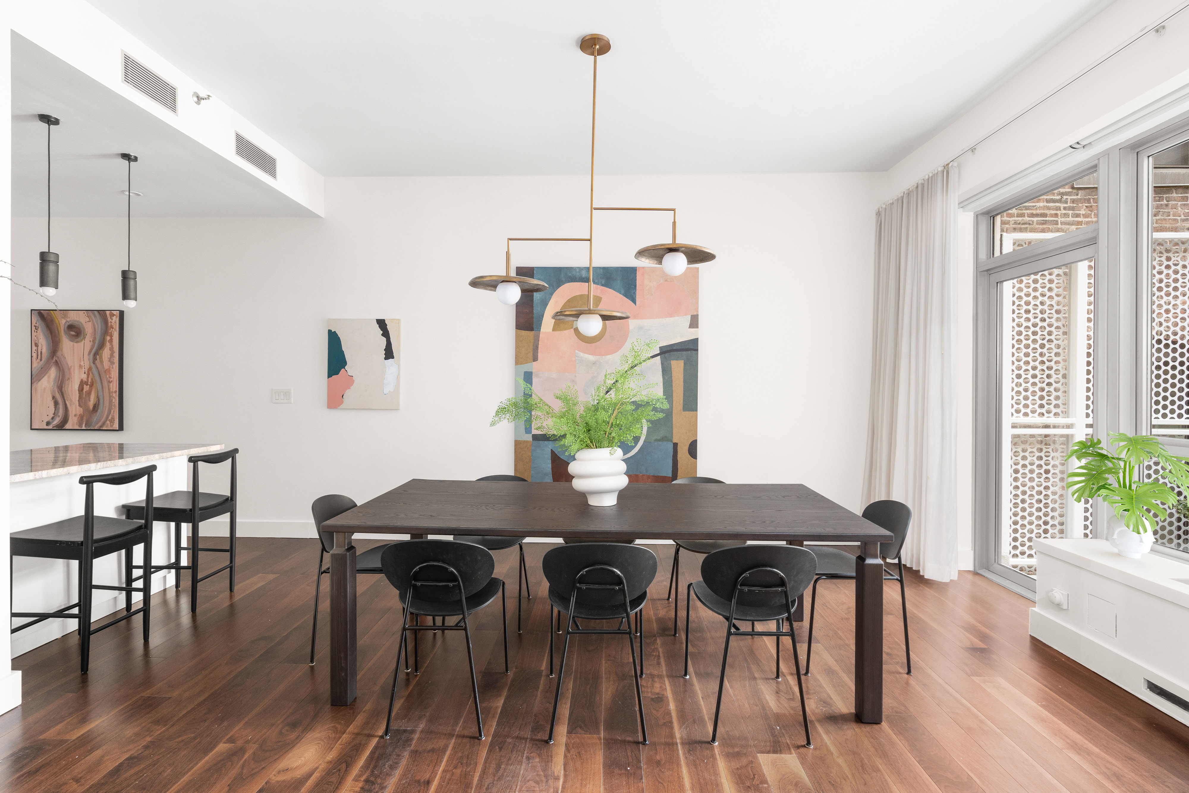 48 Bond Street, Unit 4B Manhattan, NY 10012 - Photo 4 of 15 a view of a dining room with furniture window and wooden floor