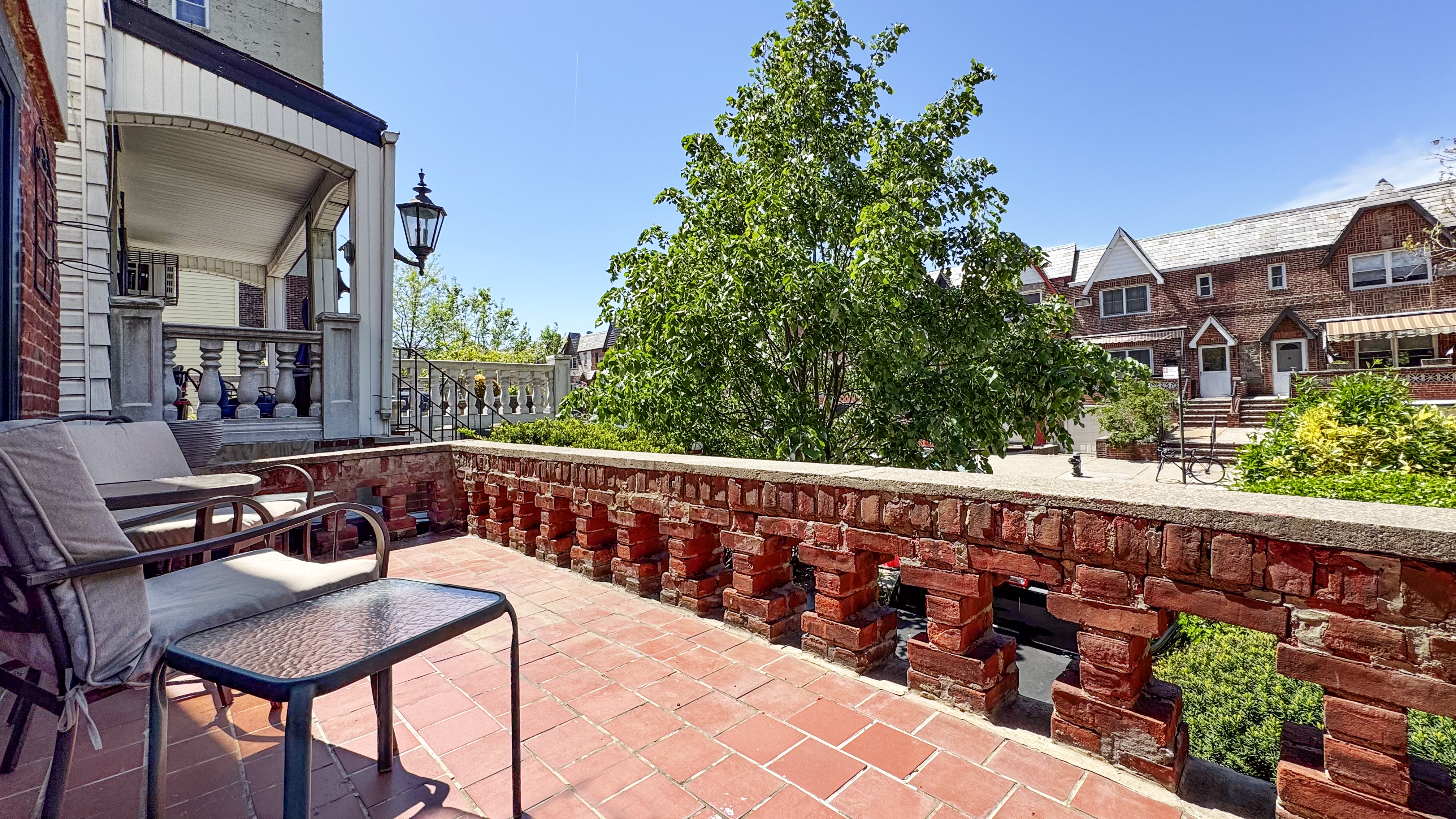 41-27 39th Place Queens, NY 11104 - Photo 11 of 13 a view of a balcony with chairs