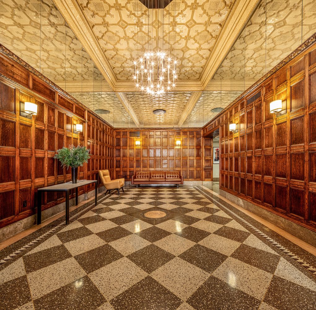 96 Schermerhorn Street, Unit 2F Brooklyn, NY 11201 - Photo 7 of 10 a view of a lobby with a table and chairs
