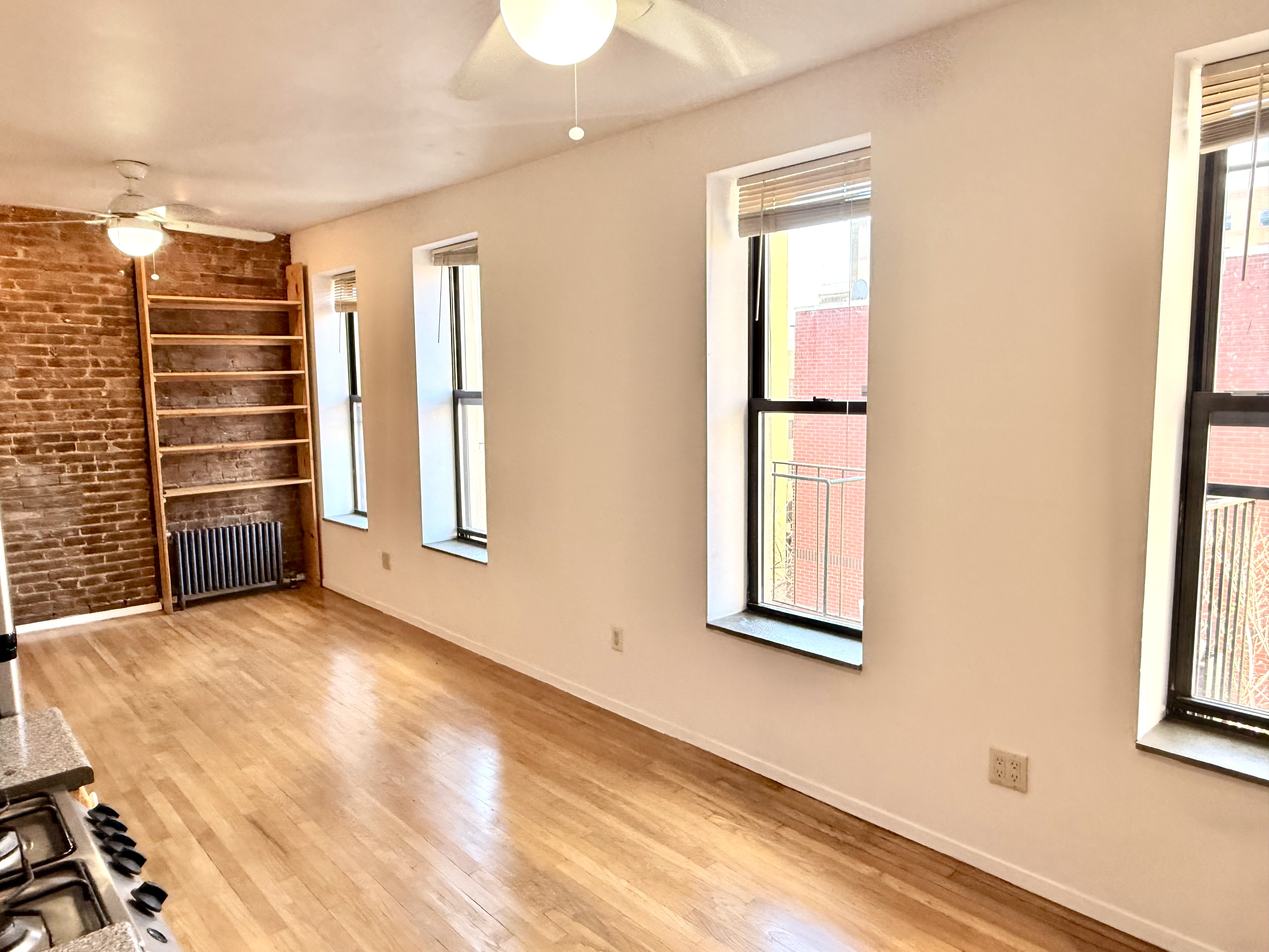 1672 Park Avenue, Unit 4A Manhattan, NY 10035 - Photo 2 of 11 a view of an empty room with a window