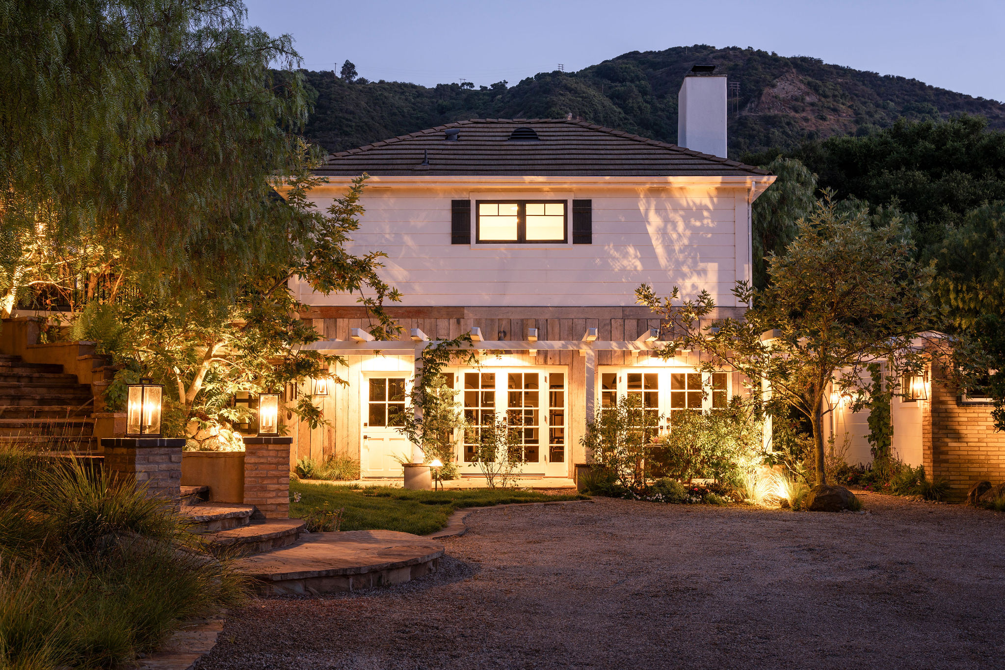 560 Cold Canyon Road Calabasas, CA 91302 - Photo 2 of 84 a front view of a house with a yard
