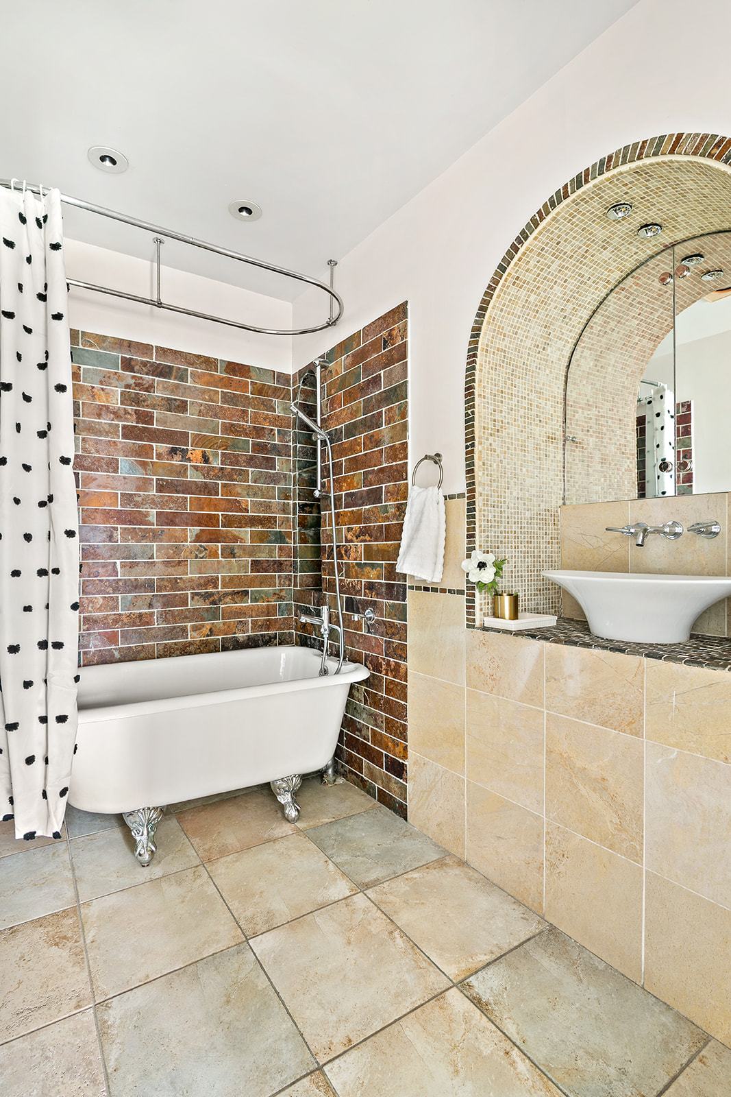 520 LaGuardia Place, Unit 6N Manhattan, NY 10012 - Photo 7 of 11 a bathroom with a bathtub and shower