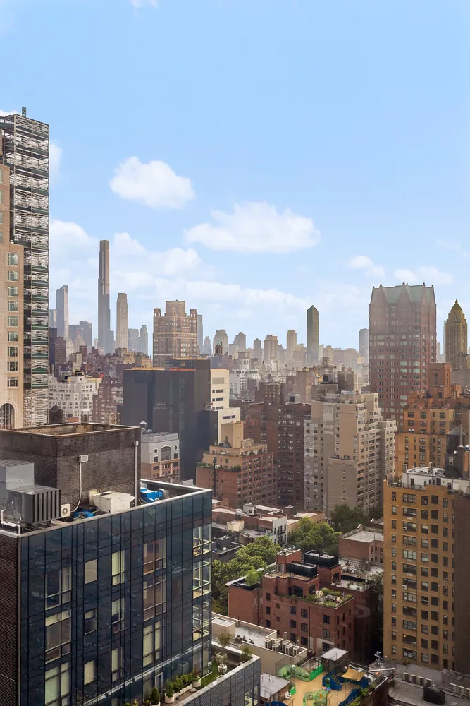 a view of a city with tall buildings