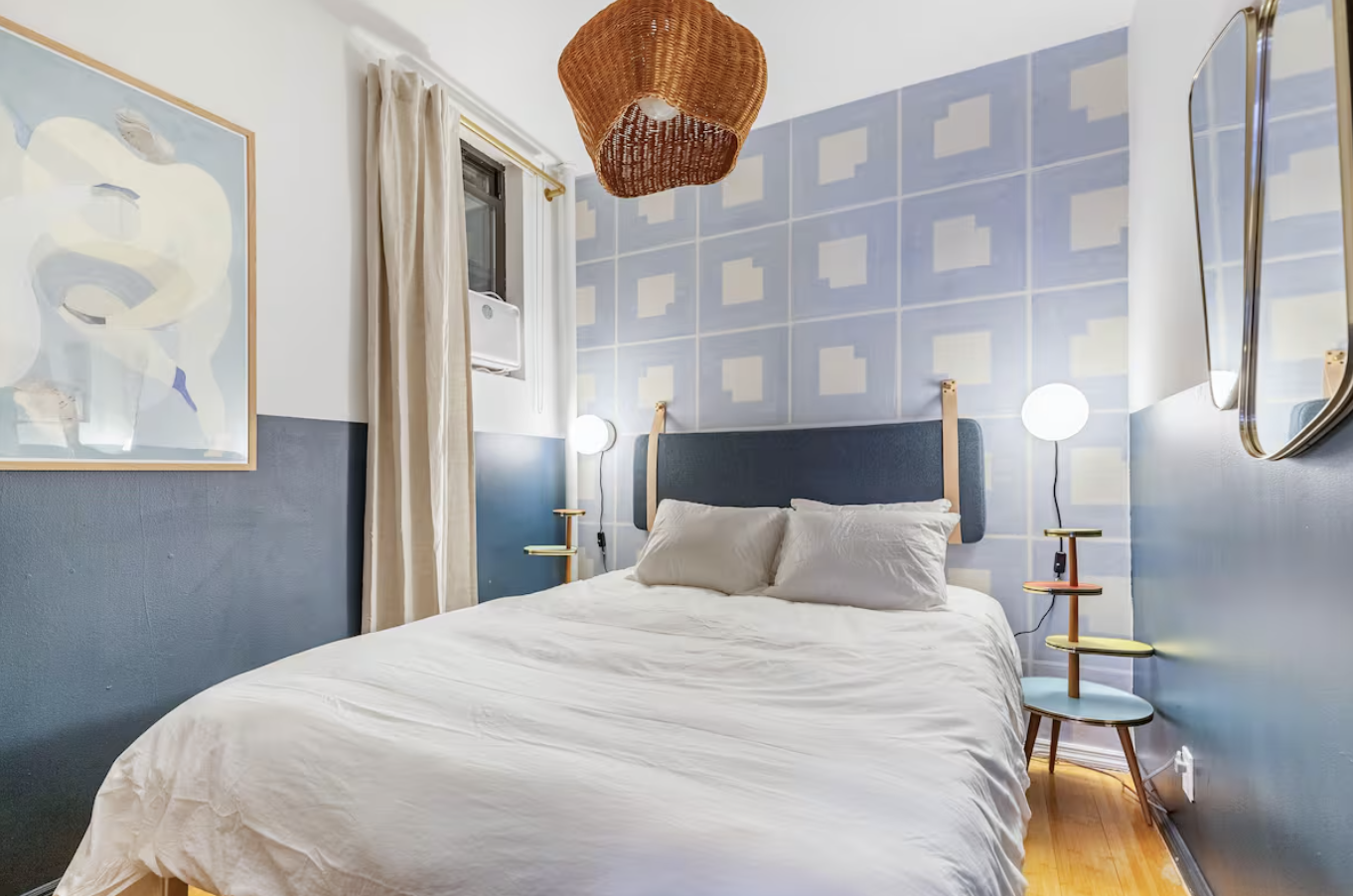 240 Mulberry Street, Unit 2 Manhattan, NY 10012 - Photo 13 of 19 a bedroom with a bed and a chandelier