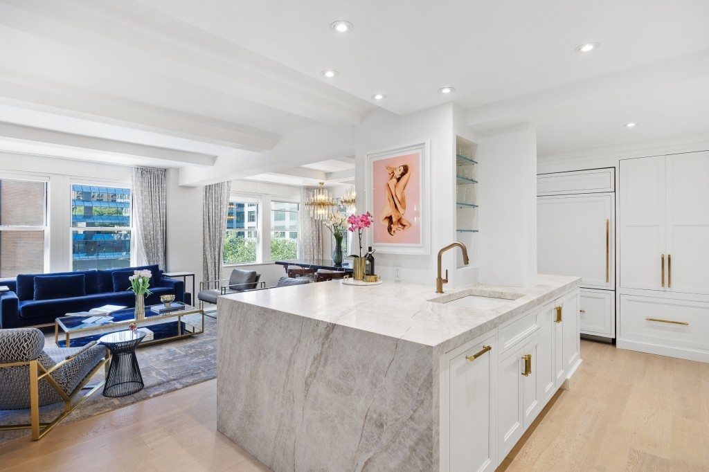 433 West 34th Street, Unit 4ABC Manhattan, NY 10001 - Photo 2 of 20 a large white kitchen with a large window