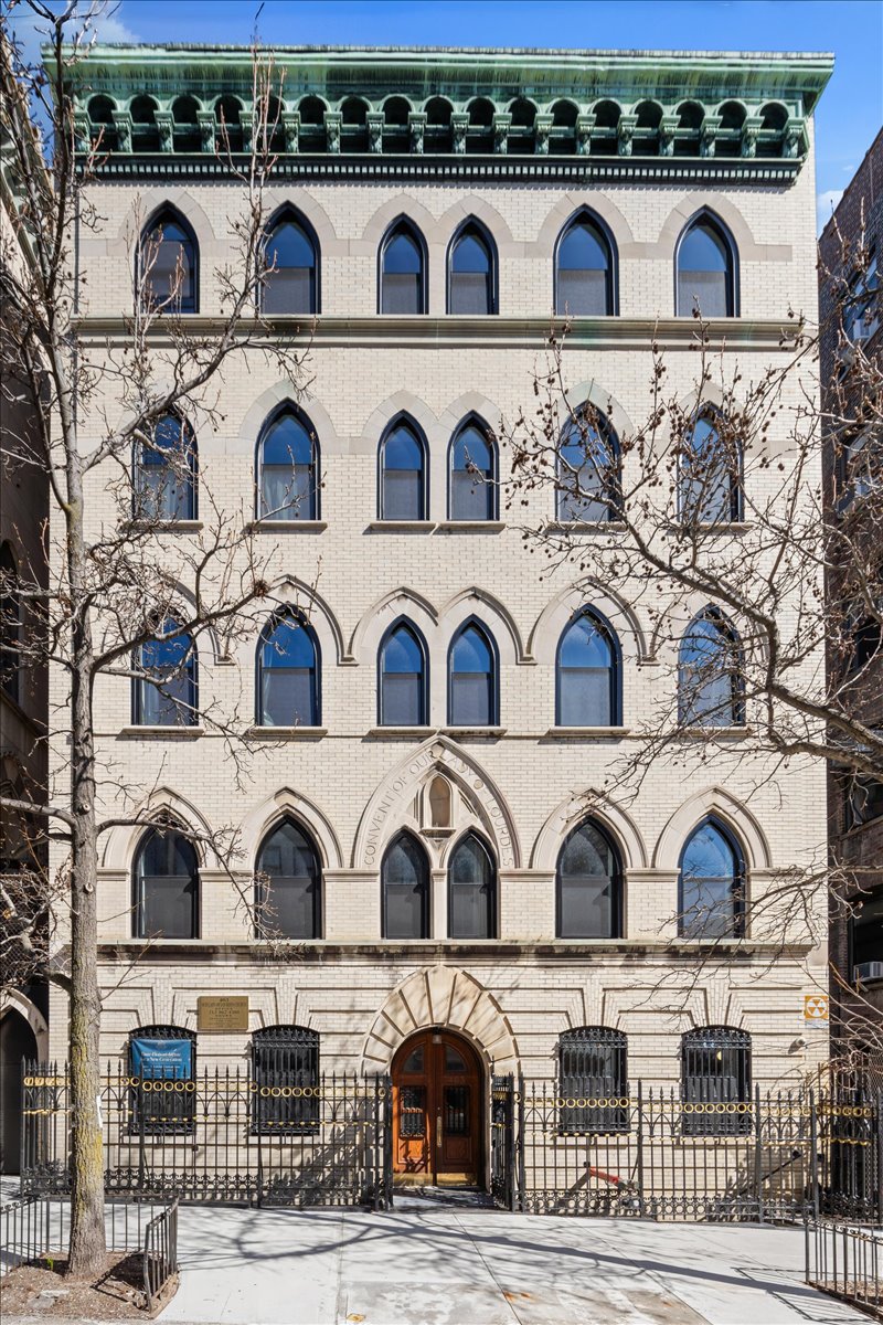 463 West 142nd Street, Unit 4B Manhattan, NY 10031 - Photo 9 of 10 a view of a kitchen sink and cabinets