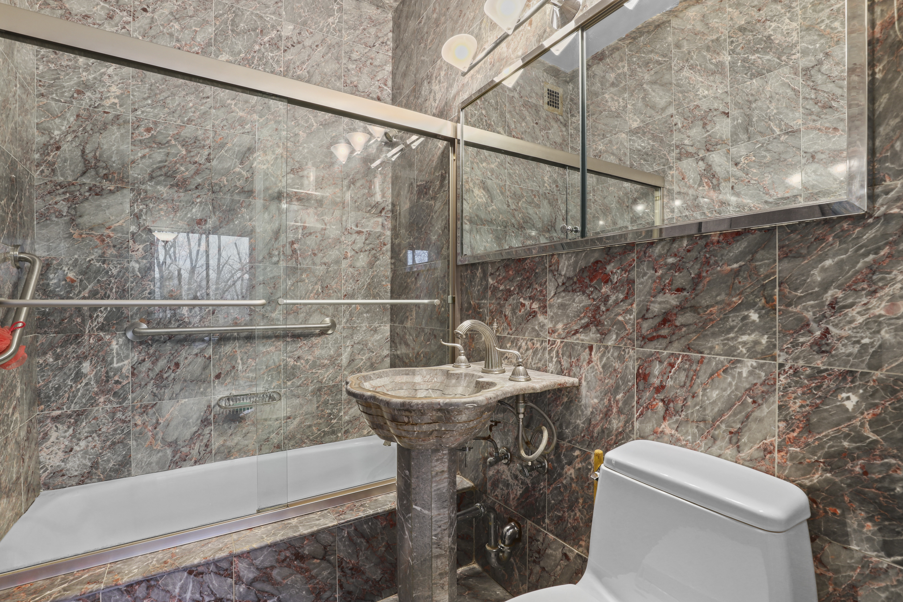 4455 Douglas Avenue, Unit 3FE Bronx, NY 10471 - Photo 34 of 53 a bathroom with a sink a toilet and shower