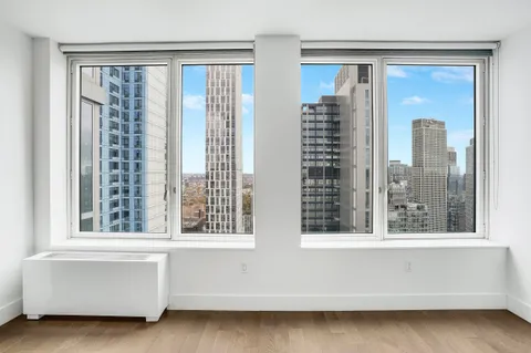 a kitchen with a stove and a refrigerator
