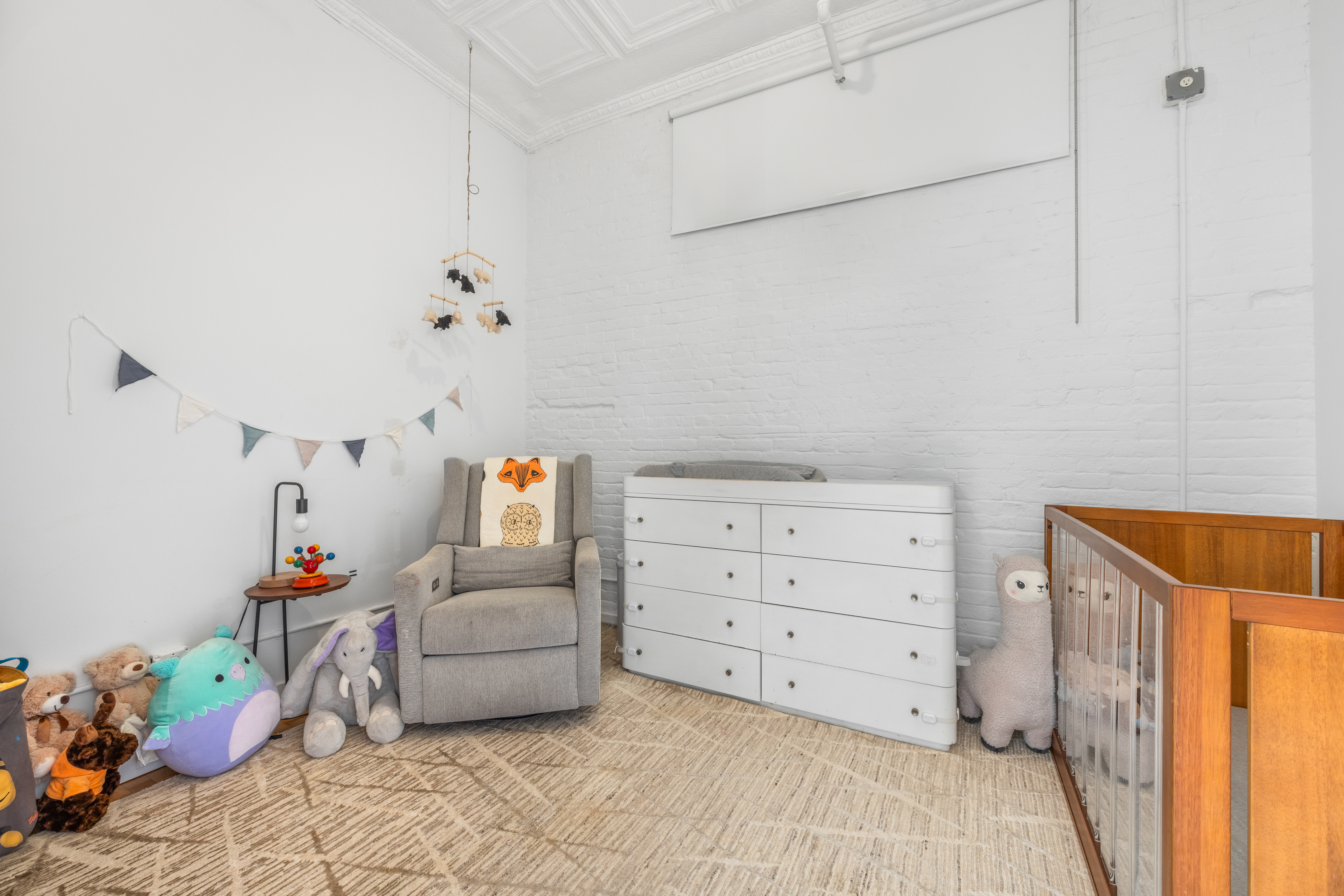 5 White Street, Unit 5B Manhattan, NY 10013 - Photo 18 of 21 a bedroom with a bed and a window