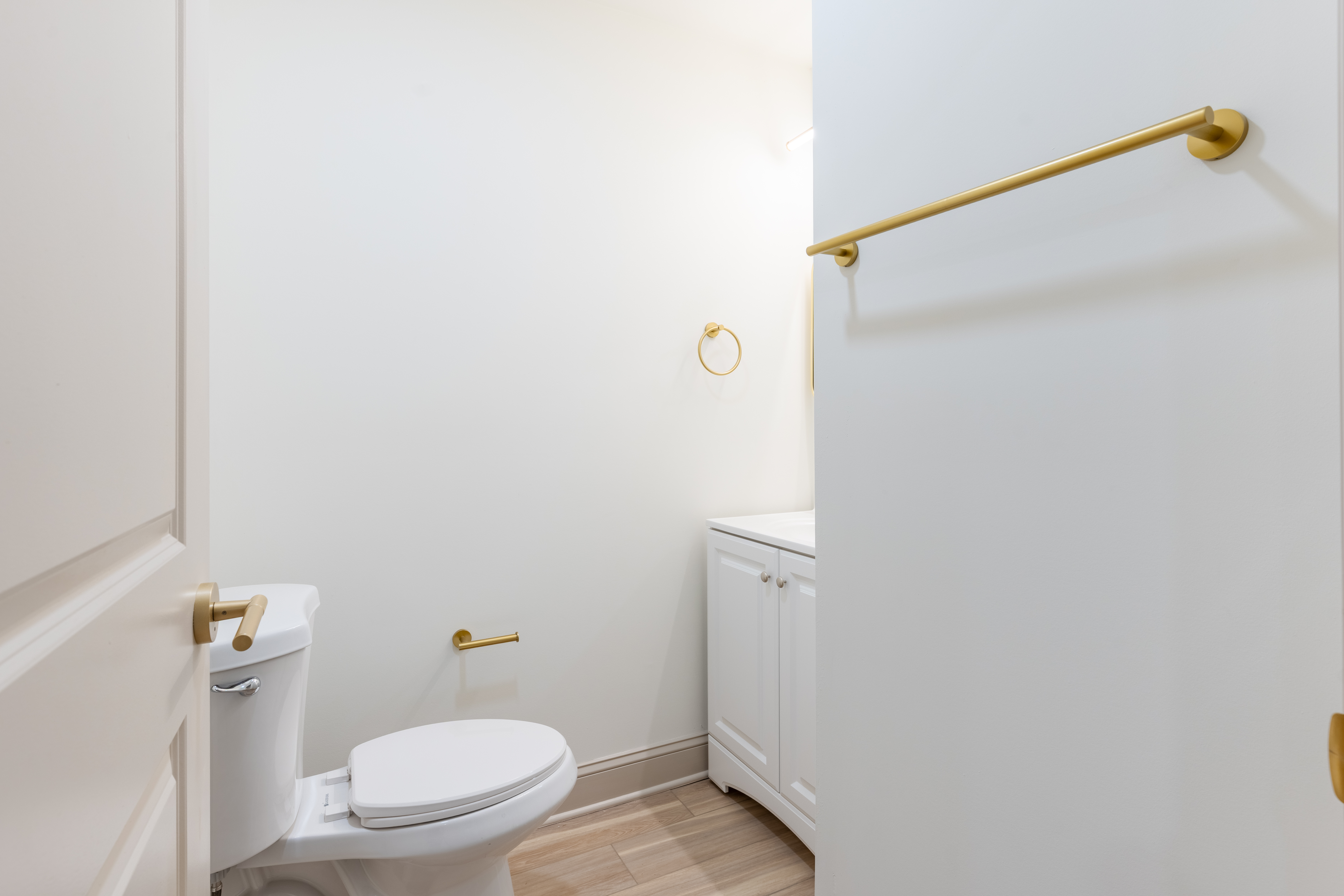 415 North Haddon Avenue Haddonfield, NJ 08033 - Photo 22 of 23 a white toilet sitting next to a bathroom sink